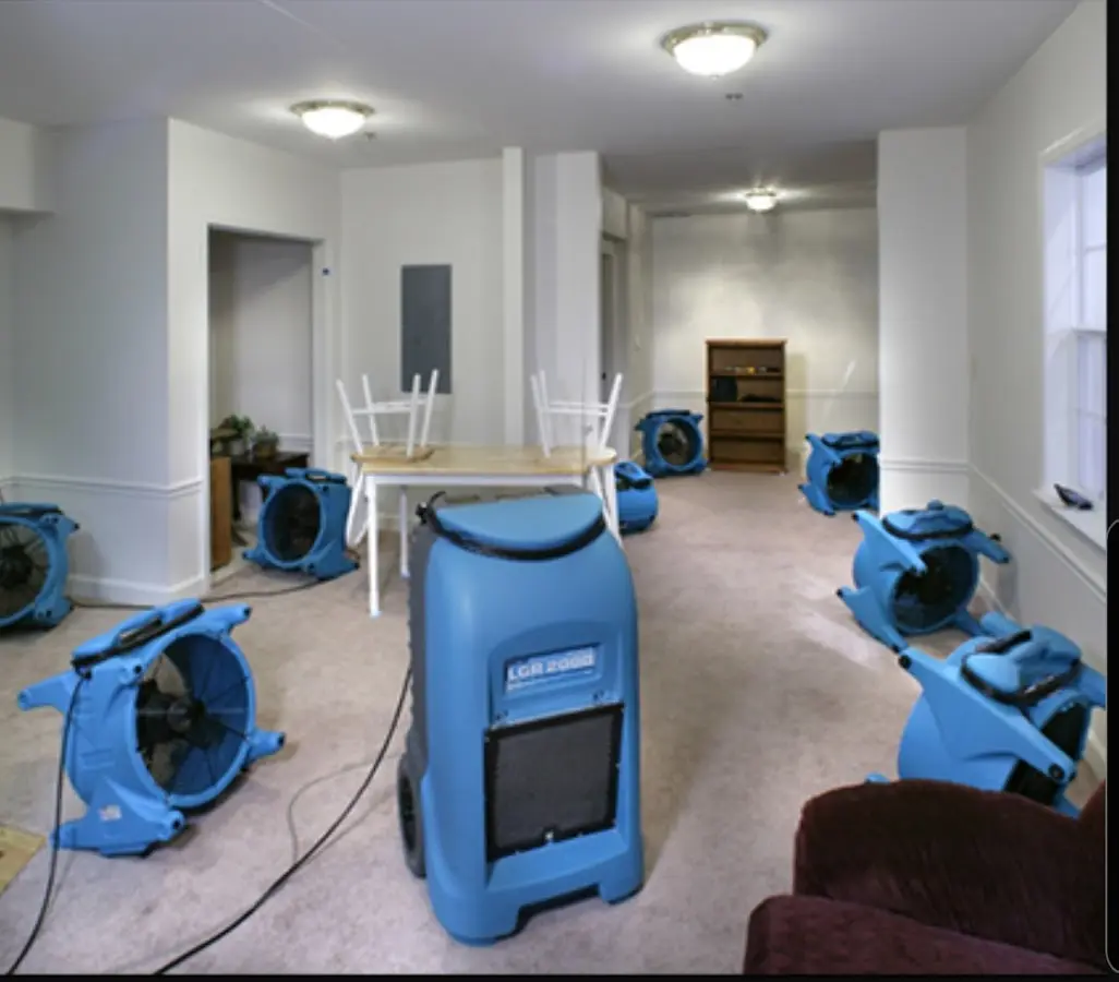 Air movers and dehumidifier setup for Water Extraction & Removal in Earl